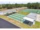 Community shuffleboard courts with covered seating areas at 1250 S Pinellas Ave # 713, Tarpon Springs, FL 34689