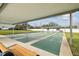 Covered shuffleboard courts with benches and ample parking at 1250 S Pinellas Ave # 713, Tarpon Springs, FL 34689