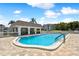 Refreshing community swimming pool with surrounding patio at 1250 S Pinellas Ave # 713, Tarpon Springs, FL 34689