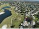 Aerial view of house and golf course community at 1318 Leland Dr, Sun City Center, FL 33573