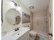 Updated bathroom with walk-in shower and vanity at 1318 Leland Dr, Sun City Center, FL 33573