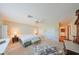 Spacious bedroom with king-size bed, double closets, and ceiling fan at 1318 Leland Dr, Sun City Center, FL 33573