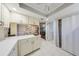 Kitchen boasts ample counter space, white cabinets, and a view into the dining area at 1318 Leland Dr, Sun City Center, FL 33573