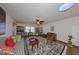 Living room features hardwood floors, comfortable seating, and a ceiling fan at 1318 Leland Dr, Sun City Center, FL 33573