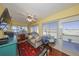 Sunroom with hardwood floors, comfy seating, and picturesque views at 1318 Leland Dr, Sun City Center, FL 33573
