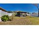 Screened patio and fenced backyard with grassy area at 1610 Bonita Bluff Ct, Ruskin, FL 33570