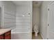 Clean bathroom with white subway tile and a tub at 1610 Bonita Bluff Ct, Ruskin, FL 33570