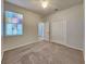 Bright bedroom with carpet flooring and double door closet at 1610 Bonita Bluff Ct, Ruskin, FL 33570