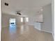 Spacious living area with tile floors and access to the backyard at 1610 Bonita Bluff Ct, Ruskin, FL 33570