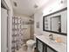 Clean bathroom with shower, toilet and vanity at 1745 E Mulberry Dr, Tampa, FL 33604