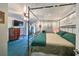 Main bedroom with king-size bed and TV at 1745 E Mulberry Dr, Tampa, FL 33604