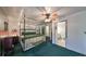 Spacious bedroom with a canopy bed and access to a private bathroom at 1745 E Mulberry Dr, Tampa, FL 33604