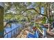 Serene waterfront dock with seating and tranquil river views at 1745 E Mulberry Dr, Tampa, FL 33604