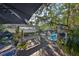 Spacious waterfront dock features a boat lift and shaded seating area at 1745 E Mulberry Dr, Tampa, FL 33604
