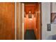 Small private elevator with wood paneling and framed artwork on the walls at 1745 E Mulberry Dr, Tampa, FL 33604