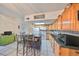 Eat-in kitchen with granite countertop and island at 1745 E Mulberry Dr, Tampa, FL 33604