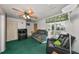 Relaxing living room with a comfortable seating area and a view to the outdoors at 1745 E Mulberry Dr, Tampa, FL 33604