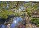 Peaceful riverfront property with lush trees and calm waters at 1745 E Mulberry Dr, Tampa, FL 33604