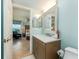 Bathroom with a vanity and view of bedroom at 19725 Gulf Blvd # 501, Indian Shores, FL 33785