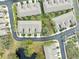 Aerial view of community with pond and townhouses at 2044 Santa Catalina Ln Dr # 2044, Riverview, FL 33578