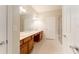 Double vanity bathroom with a large mirror and shower at 2044 Santa Catalina Ln Dr # 2044, Riverview, FL 33578