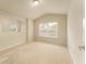 Spacious bedroom with large window and vaulted ceiling at 2044 Santa Catalina Ln Dr # 2044, Riverview, FL 33578