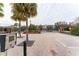 Gated community entrance with brick pavers and intercom system at 2044 Santa Catalina Ln Dr # 2044, Riverview, FL 33578