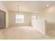 Bright dining room with neutral carpeting and a chandelier at 2044 Santa Catalina Ln Dr # 2044, Riverview, FL 33578