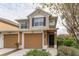 Two-story townhome with two-car garage and front yard view at 2044 Santa Catalina Ln Dr # 2044, Riverview, FL 33578