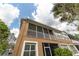 Tan building with screened balcony and white trim at 2044 Santa Catalina Ln Dr # 2044, Riverview, FL 33578