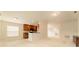 Kitchen with dark wood cabinets and a breakfast bar at 2044 Santa Catalina Ln Dr # 2044, Riverview, FL 33578