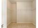 Spacious walk-in closet with wire shelving at 2044 Santa Catalina Ln Dr # 2044, Riverview, FL 33578