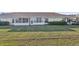 Spacious backyard with grassy lawn at 2315 New Orchard Ct, Sun City Center, FL 33573