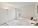 Well-lit bedroom featuring two twin beds and a window at 2315 New Orchard Ct, Sun City Center, FL 33573