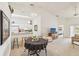 Cozy dining area with a round table and kitchen access at 2315 New Orchard Ct, Sun City Center, FL 33573