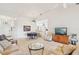 Open living area with a view of the kitchen and dining area at 2315 New Orchard Ct, Sun City Center, FL 33573