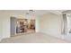 Sunroom with view into living areas and access to outdoors at 2315 New Orchard Ct, Sun City Center, FL 33573