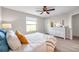 Comfortable bedroom with large window and ceiling fan at 2517 Edgewater Falls Dr, Brandon, FL 33511