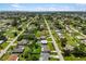 Wide aerial view of neighborhood, showcasing the property's location at 3064 Pinetree St, Port Charlotte, FL 33952