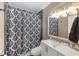 Clean bathroom with updated vanity and shower at 3064 Pinetree St, Port Charlotte, FL 33952