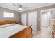 Bright bedroom with double closets and ensuite bathroom at 3064 Pinetree St, Port Charlotte, FL 33952