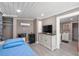 Small bedroom with a twin bed and en-suite bathroom at 3064 Pinetree St, Port Charlotte, FL 33952