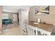 Casual dining area with table and chairs, near the kitchen and living room at 3064 Pinetree St, Port Charlotte, FL 33952