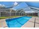 Inviting screened pool with spacious patio area at 3064 Pinetree St, Port Charlotte, FL 33952