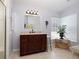 Well-lit bathroom, featuring granite vanity and updated fixtures at 3127 Ivyhill Ct, Holiday, FL 34691