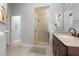 Clean bathroom with walk-in shower and granite countertop at 3127 Ivyhill Ct, Holiday, FL 34691