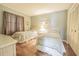 Guest bedroom with twin beds and ample closet space at 3127 Ivyhill Ct, Holiday, FL 34691