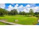 Relaxing golf course with a bench at 37015 Sandra Ave, Zephyrhills, FL 33542