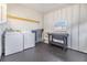 Laundry room with washer, dryer, and worktable at 37015 Sandra Ave, Zephyrhills, FL 33542