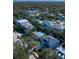 Blue house with a pool in a neighborhood setting at 4820 W San Jose St, Tampa, FL 33629